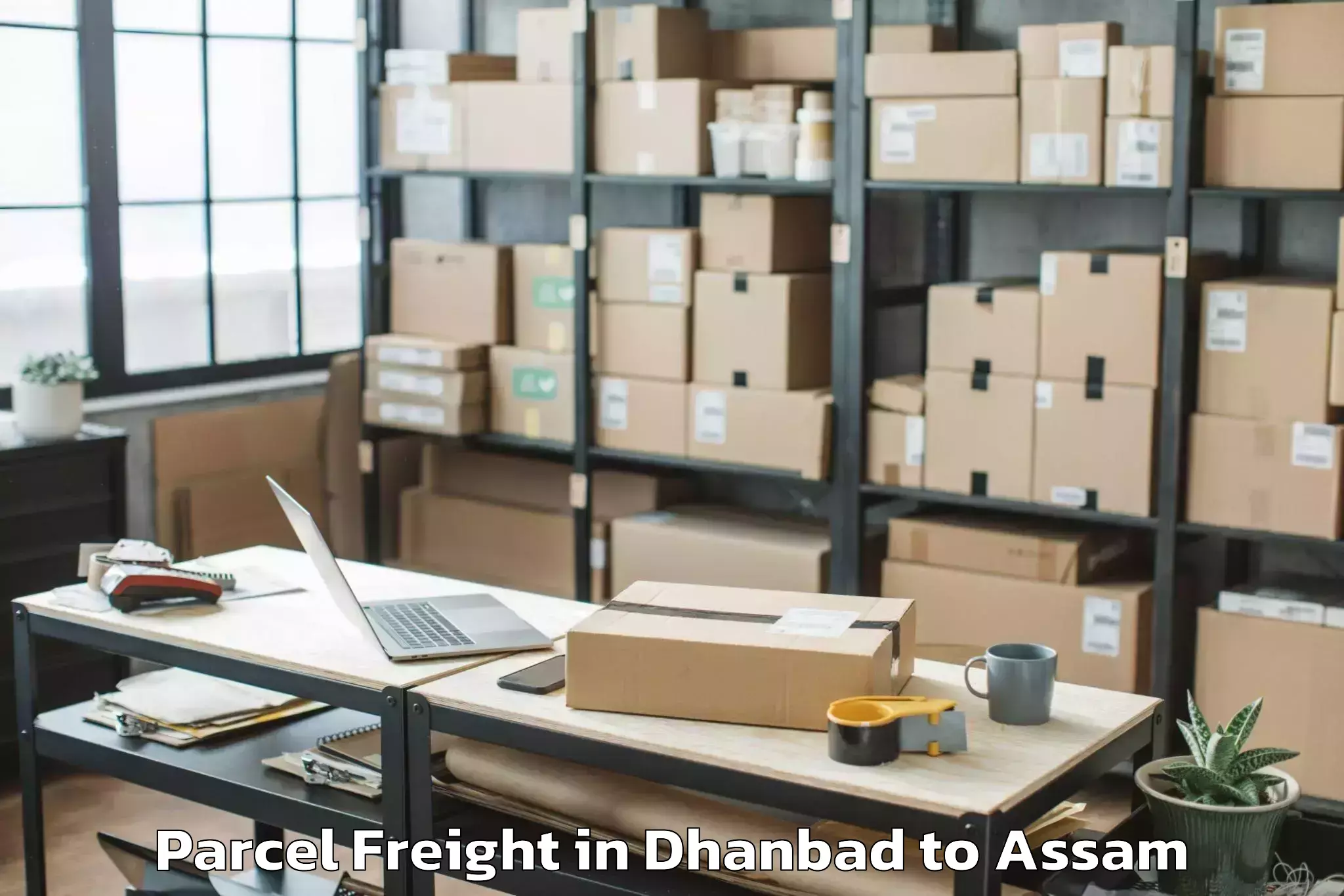 Discover Dhanbad to Raha Parcel Freight